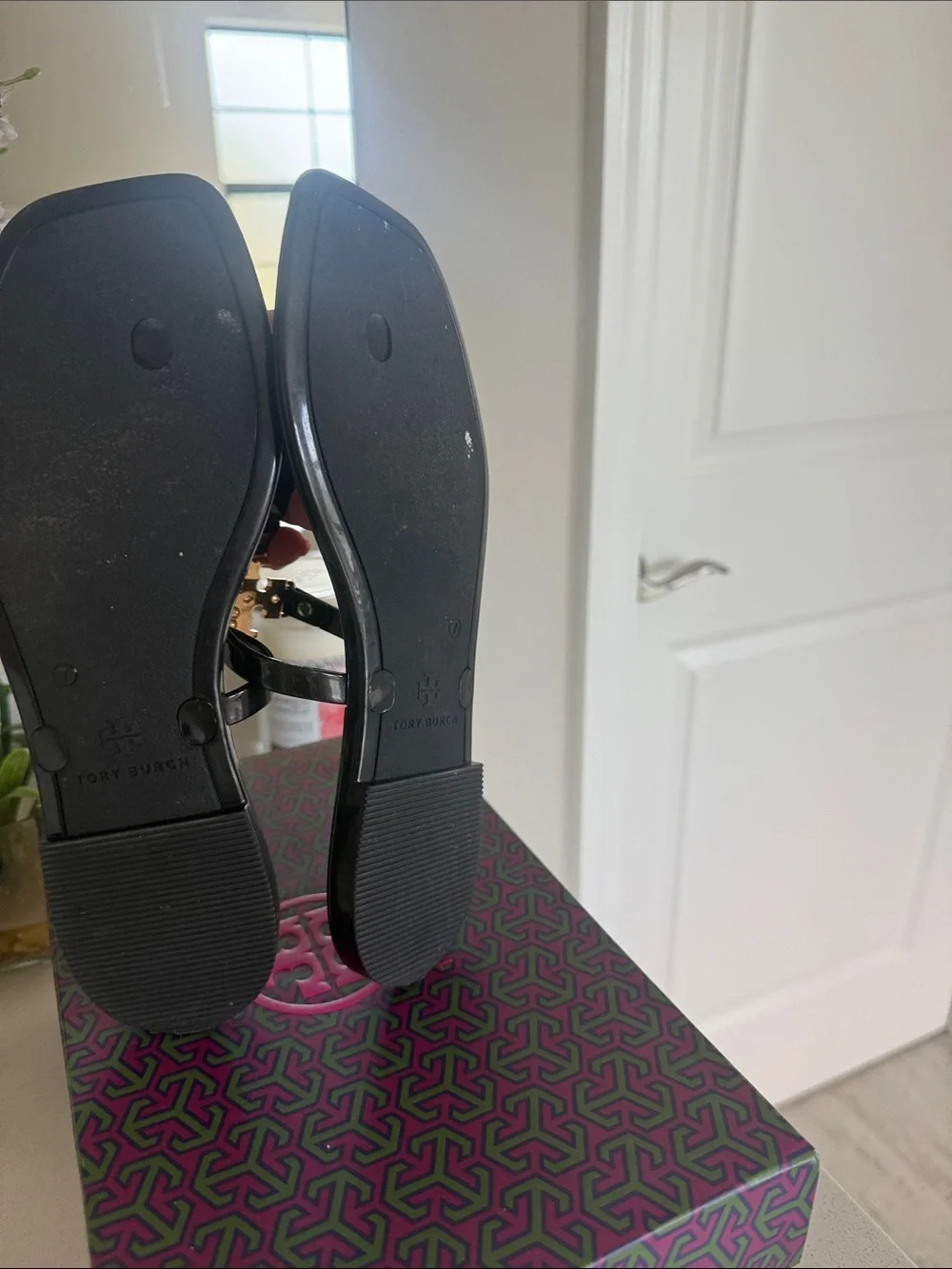 Tory Burch Black Jelly Thong Sandals with Gold Logo